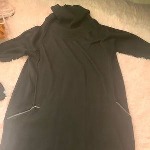 Black turtleneck sweater dress. With pockets